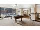 Game room with a pool table, lounge seating, and views of the outdoor terrace at 1020 15Th St # 42A, Denver, CO 80202