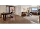 Bright living room with wood floors, comfortable seating, and scenic views from a large window at 1020 15Th St # 42A, Denver, CO 80202