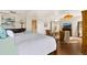 Serene main bedroom with hardwood floors and a view of the outside at 1020 15Th St # 42A, Denver, CO 80202