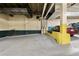 Assigned and reserved spot in covered parking garage with yellow columns at 1020 15Th St # 42A, Denver, CO 80202