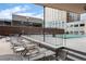 Rooftop pool deck features lounge chairs and views of the city skyline at 1020 15Th St # 42A, Denver, CO 80202