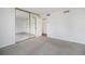 Carpeted bedroom with closet and neutral walls at 1020 15Th St # 15G, Denver, CO 80202