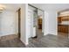 Bedroom area showcases a closet, neutral walls and direct access to kitchen at 1020 15Th St # 15G, Denver, CO 80202