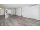 Living room featuring wood floors, white walls, and neutral finishes at 1020 15Th St # 15G, Denver, CO 80202