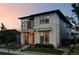 Two-story home with modern design and stone accents at 9385 E 58Th Dr, Denver, CO 80238