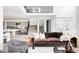 Elegant living room with brown sofa and natural light at 9385 E 58Th Dr, Denver, CO 80238