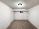 Finished basement with carpet and window at 945 W 8Th Avenue Dr, Broomfield, CO 80020