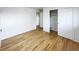 Spacious bedroom with hardwood floors, closet, and painted doors at 945 W 8Th Avenue Dr, Broomfield, CO 80020