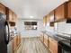 Eat-in kitchen features updated appliances and ample cabinet space at 945 W 8Th Avenue Dr, Broomfield, CO 80020