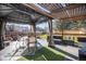Cozy backyard deck with gazebo, patio furniture, and landscaped lawn at 17233 E Princeton Dr, Aurora, CO 80013
