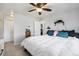 Spacious bedroom with a ceiling fan and carpet flooring at 17233 E Princeton Dr, Aurora, CO 80013