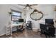 Bright home office with built in desk and chair at 17233 E Princeton Dr, Aurora, CO 80013