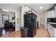 Functional kitchen featuring tile floors and black appliances at 17233 E Princeton Dr, Aurora, CO 80013