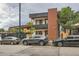 Modern two-story home with brick accent, complemented by street parking and nearby landscaping at 4025 Jason St # 101, Denver, CO 80211