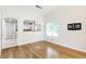 Dining room with hardwood floors open to the kitchen, featuring pendant lighting at 7400 W Grant Ranch Blvd # 52, Littleton, CO 80123