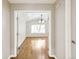 Light-filled living room featuring hardwood flooring and french doors at 7400 W Grant Ranch Blvd # 52, Littleton, CO 80123