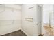 Walk-in closet leading to bathroom at 7400 W Grant Ranch Blvd # 52, Littleton, CO 80123