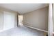 Bedroom featuring neutral carpet, and a closet at 11301 Vernon Way, Parker, CO 80134