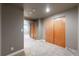 Hallway with carpet and closet space for storage and organization at 11301 Vernon Way, Parker, CO 80134