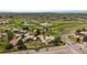 A high angle view of the community near a beautiful green golf course and lake at 8798 Chase Dr # 4, Arvada, CO 80003