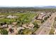 A high angle view of the community near a beautiful green golf course and lake at 8798 Chase Dr # 4, Arvada, CO 80003