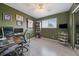 Serene bedroom showcasing two desks, neutral walls and lots of decor at 8798 Chase Dr # 4, Arvada, CO 80003