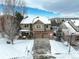 Two-story house with snow-covered yard, viewed from above at 3925 Broadview Pl, Castle Rock, CO 80109