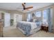 Main bedroom with king bed, and en-suite bathroom access at 3925 Broadview Pl, Castle Rock, CO 80109