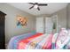 Bedroom with ceiling fan and access to hallway at 3925 Broadview Pl, Castle Rock, CO 80109