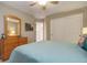 Bedroom with a dresser, full bed, and ceiling fan at 3925 Broadview Pl, Castle Rock, CO 80109