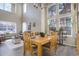 Spacious dining room with large windows and hardwood floors at 3925 Broadview Pl, Castle Rock, CO 80109