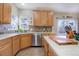 Kitchen with tile backsplash, stainless steel appliances, and wood cabinets at 3925 Broadview Pl, Castle Rock, CO 80109