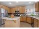 Modern kitchen with stainless steel appliances and an island at 3925 Broadview Pl, Castle Rock, CO 80109