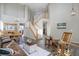 High ceiling living room with hardwood floors and a staircase at 3925 Broadview Pl, Castle Rock, CO 80109