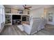 Living room with a fireplace and built-in shelving at 3925 Broadview Pl, Castle Rock, CO 80109