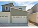 Exterior view of a modern house featuring a two-car garage and neutral color scheme at 5278 Warrior St, Frederick, CO 80504