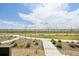 Tranquil view from the property showcasing the beautiful landscape and serene walking paths in the neighborhood at 5278 Warrior St, Frederick, CO 80504