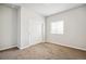 Spacious bedroom with neutral walls and carpet at 6104 Black Mesa Rd, Frederick, CO 80516