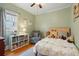 Bright and inviting bedroom with hardwood floors and a cozy atmosphere at 3415 N Vine St, Denver, CO 80205