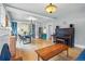 Bright open-concept dining area featuring stylish lighting and hardwood floors at 3415 N Vine St, Denver, CO 80205