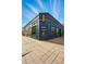 Unique building exterior with colorful mural and modern design, located in a vibrant urban setting at 3415 N Vine St, Denver, CO 80205