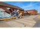 Exterior of building featuring a mural of a musician playing guitar in a vibrant outdoor area at 3415 N Vine St, Denver, CO 80205