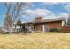 Brick and siding home with large, open backyard at 6847 S Hill St, Littleton, CO 80120