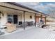 Covered patio area featuring seating and a grill at 6847 S Hill St, Littleton, CO 80120