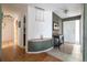 Bright entryway with tiled floor, modern lighting, and stylish table decor at 6847 S Hill St, Littleton, CO 80120