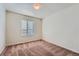 A simple bedroom with carpet, one window and neutral walls at 42367 Glen Abbey Dr, Elizabeth, CO 80107