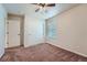 Neutral bedroom includes closet, window and carpeting at 42367 Glen Abbey Dr, Elizabeth, CO 80107