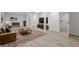 Finished basement with modern flooring, large television, stylish furniture, and ample living space at 2117 S Balsam Ct, Lakewood, CO 80227