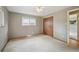 Bedroom featuring carpet, a window, and a ceiling fan with light at 3784 Swadley St, Wheat Ridge, CO 80033