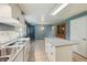 Well-equipped kitchen featuring modern appliances, ample counter space, and an open layout, great for cooking and entertaining at 3784 Swadley St, Wheat Ridge, CO 80033